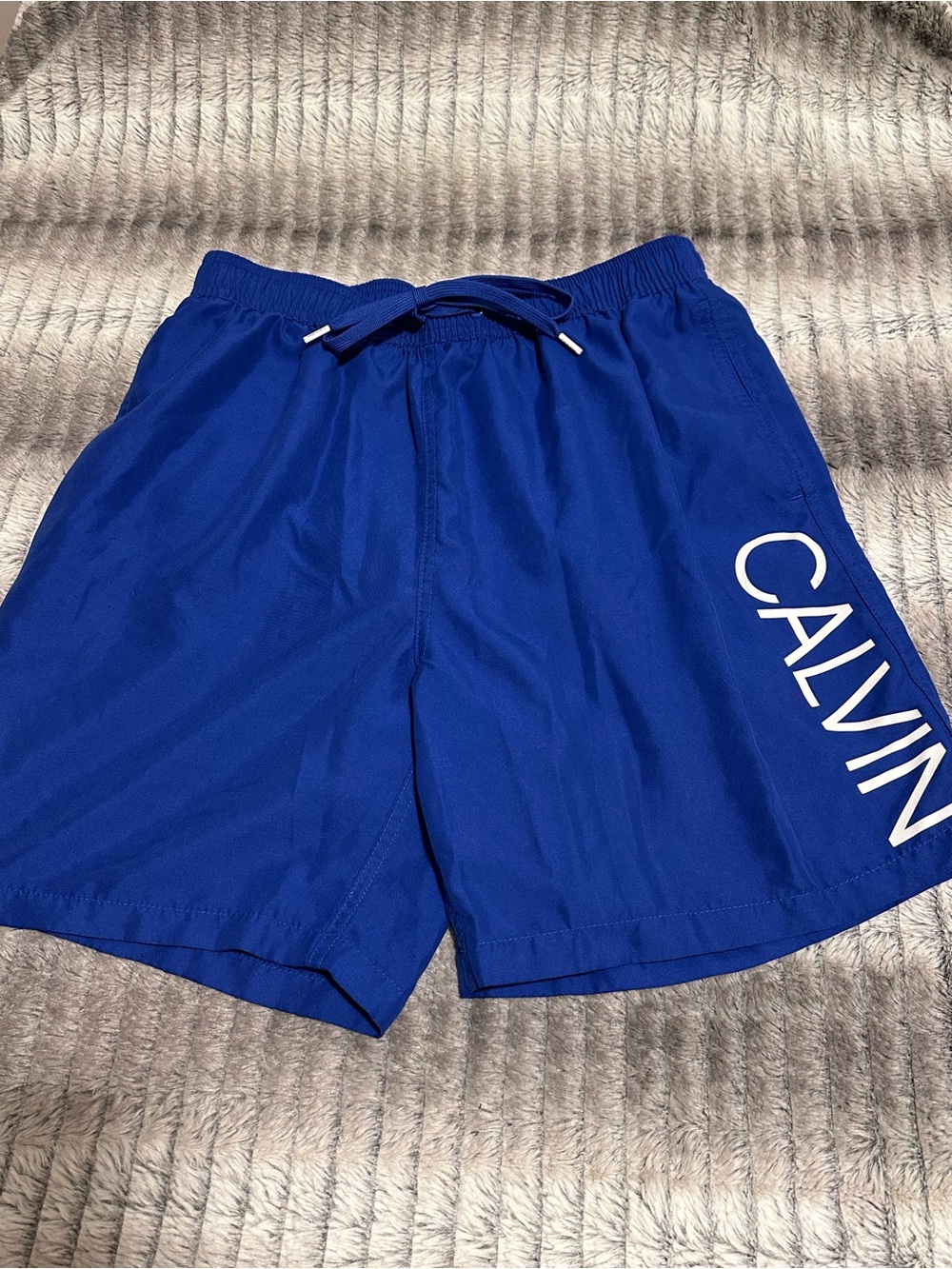 Calvin Klein Blue 5’inseam Swim Trunks
Size Medium